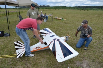 Fun Fly 2015 - Shaun holding Tom's new Pilot-RC Decathlon.