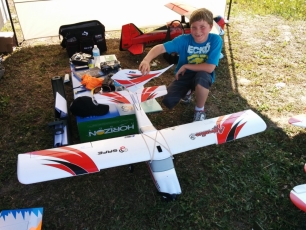 Marcus was told no new plane until he was good enough to rip off control surfaces. Dad bought him a SBach 342 after this. :)